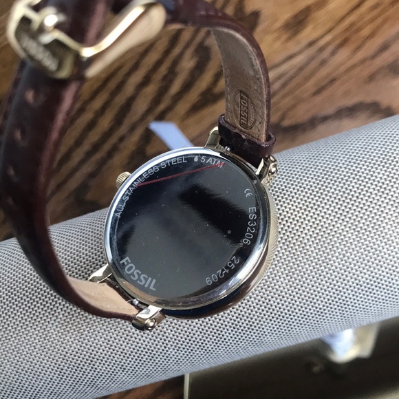 Gold face with tan strap fossil watch